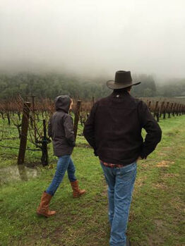 Discussing pruning on a rainy day on Sonoma Mountain.
