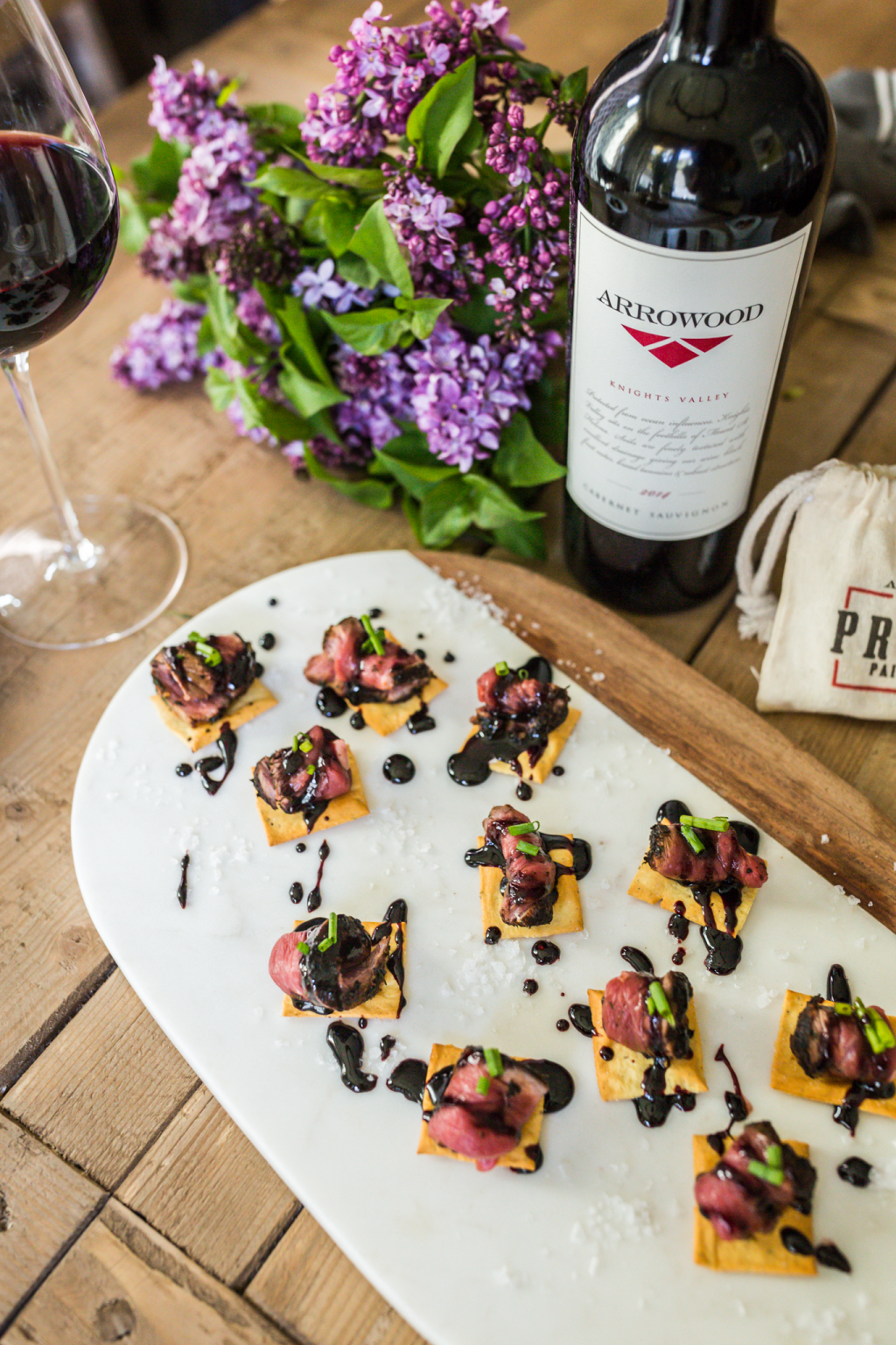 LAMB CARPACCIO CROSTINI WITH BLACKBERRY BALSAMIC REDUCTION