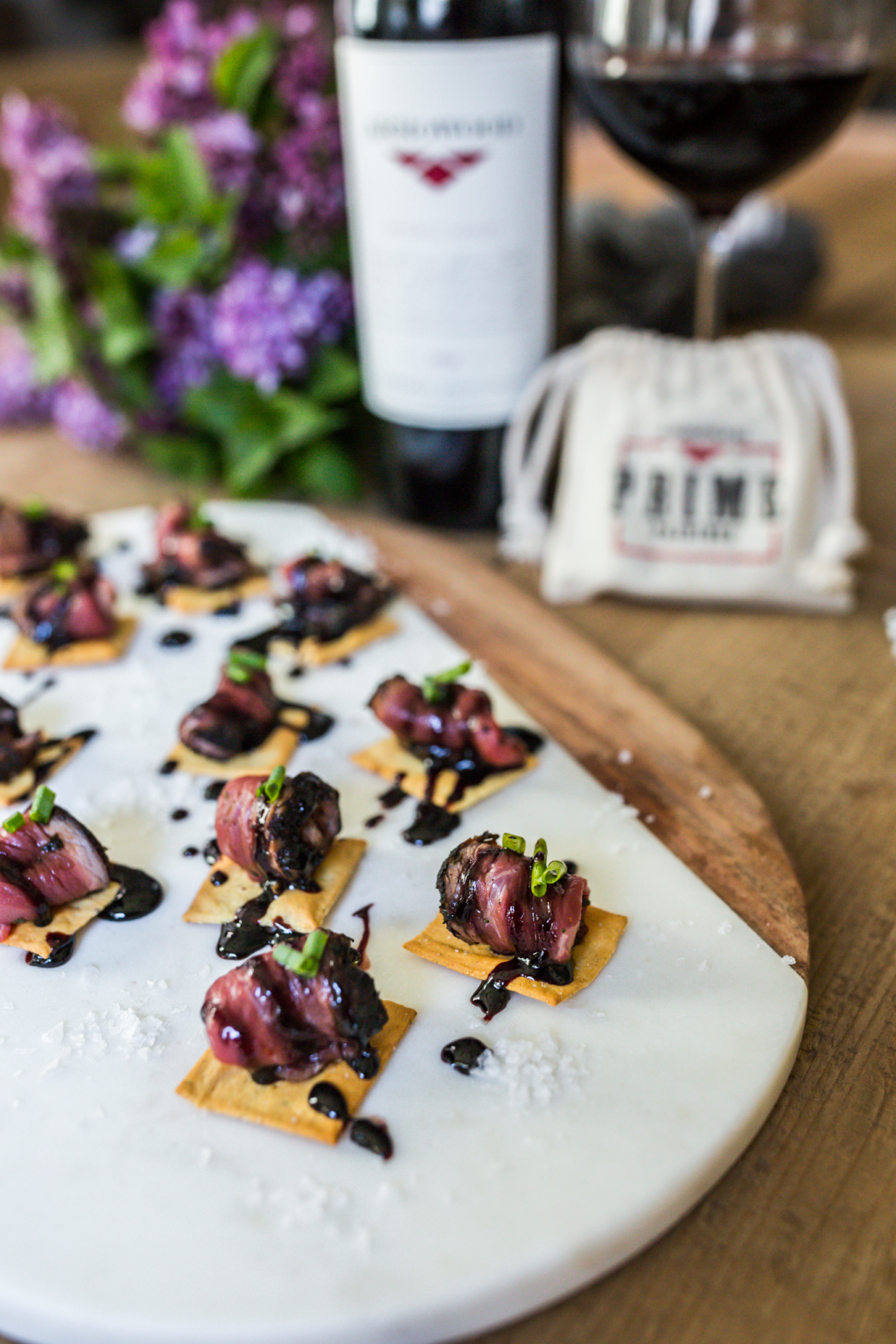 LAMB CARPACCIO CROSTINI WITH BLACKBERRY BALSAMIC REDUCTION